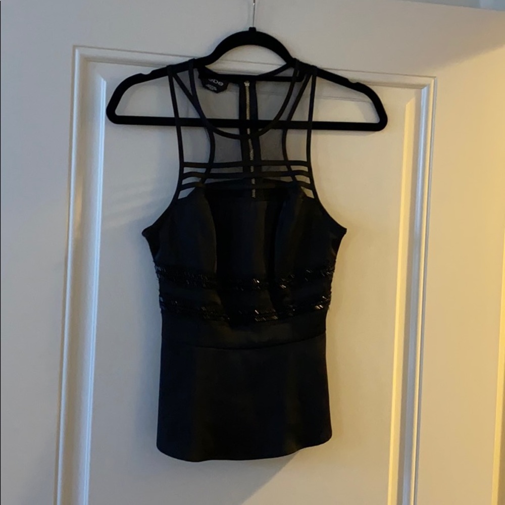 Black peplum shirt with sparkle detail